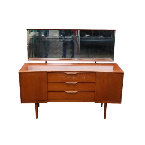 309 - Austin Suite of London Mid Century Teak Dressing table of 3 drawers flanked by single cupboards. 131... 