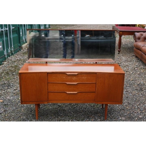 309 - Austin Suite of London Mid Century Teak Dressing table of 3 drawers flanked by single cupboards. 131... 