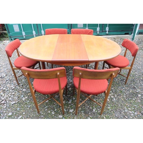 310 - G Plan Mid Century Teak Oval extending table and 6 chairs with upholstered seats. 167cm in Length by... 