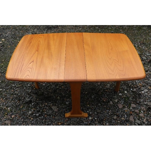 315 - Ercol Blonde Elm Gateleg side table with Gold Label. 101cm in Length by 68cm in Width by 46cm in Hei... 