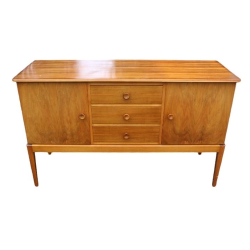 319 - Gordon Russell limited Broadway of Worcester Walnut Sideboard of 3 Drawers flanked by Cupboards on l... 