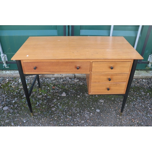 321 - Mid Century German desk with ebonised tapering legs of one long and three short drawers with turned ... 