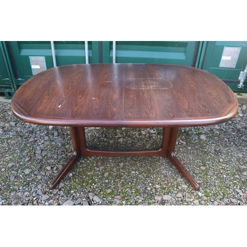 323 - Danish Edvard Valenstinsen Rosewood Dining table of oval form with 2 extra leaves over single suppor... 