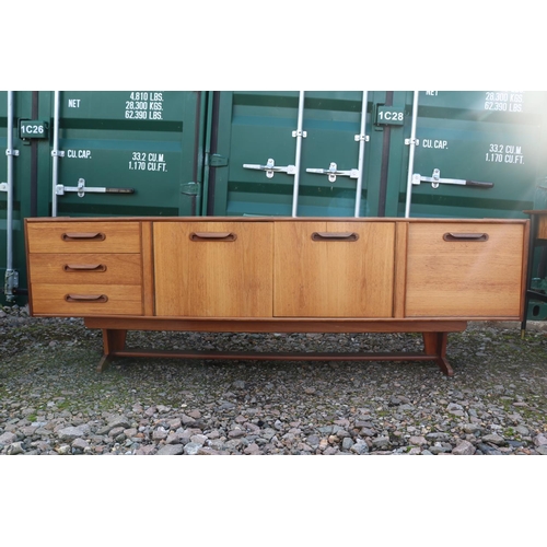 330 - Mid Century Danish style Teak sideboard of 3 drawers and 3 cupboards with cup handles and narrow bas... 