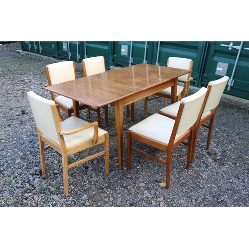 335 - Gordon Russell of Broadway Worcester for Heals Dining table 153cm x 78cm x 76cm and a set of 6 uphol... 