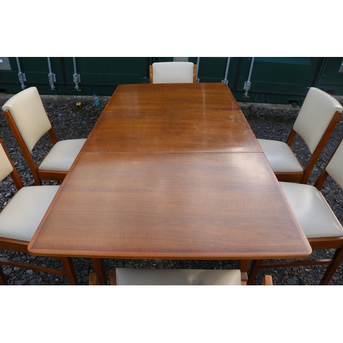 335 - Gordon Russell of Broadway Worcester for Heals Dining table 153cm x 78cm x 76cm and a set of 6 uphol... 