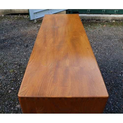 336 - Ercol Windsor Mid Century Elm Sideboard of 3 cupboards over 2 drawers on casters.  129cm x 71cm x 11... 