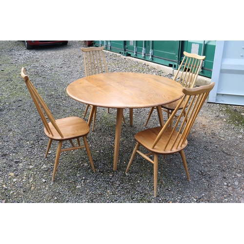 338 - Ercol Golden Dawn drop leaf dining table and 4 chairs. 124cm x 71cm x 113cm