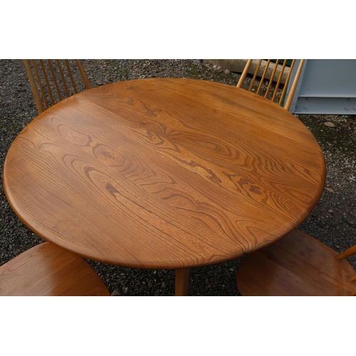 338 - Ercol Golden Dawn drop leaf dining table and 4 chairs. 124cm x 71cm x 113cm