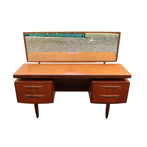 340 - G Plan Fresco Teak Dressing table of 5 drawers with mirror back and tapering legs. 151cm x 46cm x 12... 