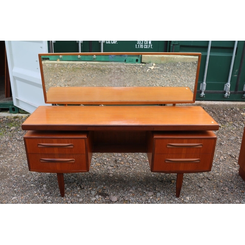 340 - G Plan Fresco Teak Dressing table of 5 drawers with mirror back and tapering legs. 151cm x 46cm x 12... 