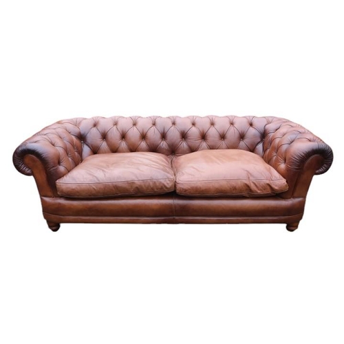 342 - Good Quality 20thC Brown Leather Chesterfield 2 seater sofa with scroll arms above turned feet. 216c... 