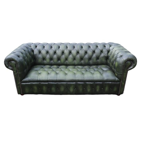 349 - 20thC Green Leather Chesterfield Sofa with button back and brass stud decoration and applied turned ... 