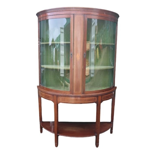 351 - Edwardian bow fronted Inlaid Mahogany cabinet over under tier and tapering legs. 166cm in Height by ... 