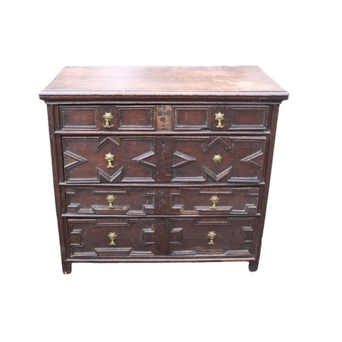 352 - 18thC Oak Chest of 4 Drawers with Geometric moulded applied decoration with brass drop handles. 97cm... 