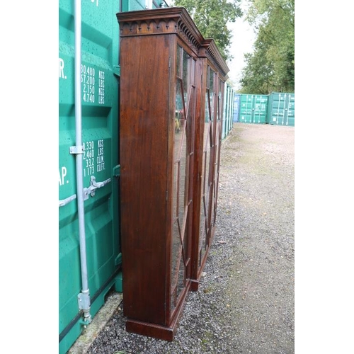 353 - Victorian Mahogany Breakfront Astragal glazed triple bookcase with moulded fretwork on stepped base.... 