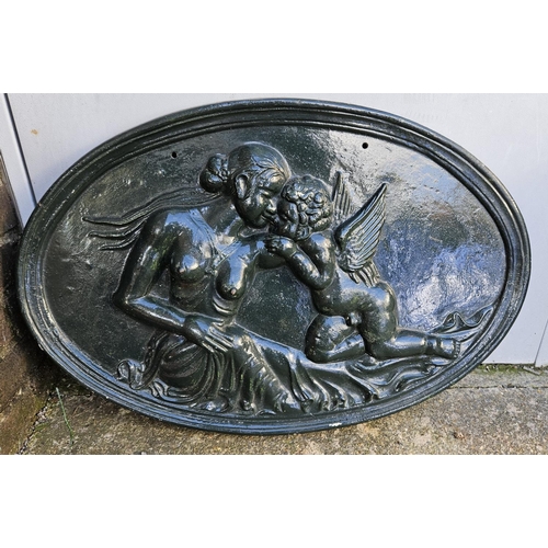 372 - Oval Cast Iron Painted roundel with Nude and Cherub decoration 72cm in Width