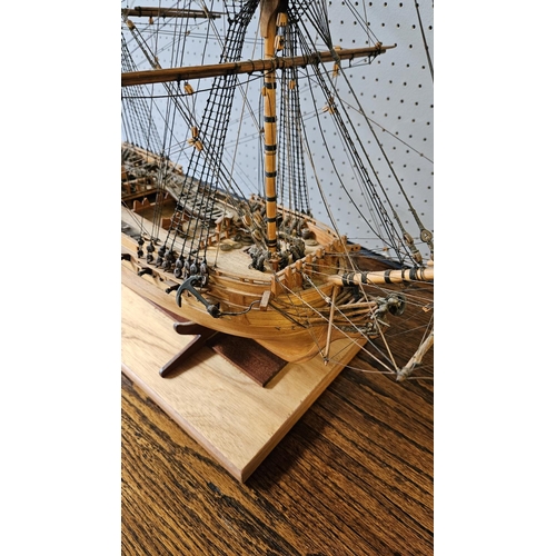 39A - Fine Scratch built model of a British Frigate mounted on wooden stand under Perspex case. 81cm x 68c... 