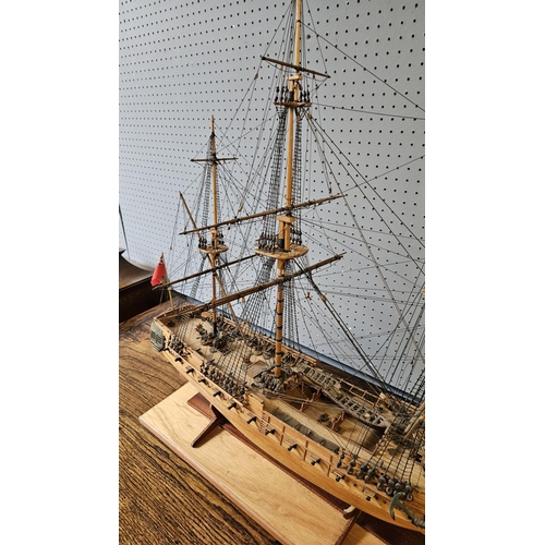 39A - Fine Scratch built model of a British Frigate mounted on wooden stand under Perspex case. 81cm x 68c... 