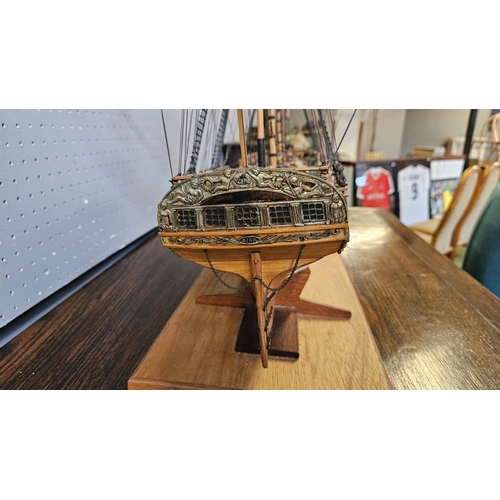 39A - Fine Scratch built model of a British Frigate mounted on wooden stand under Perspex case. 81cm x 68c... 