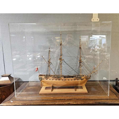 39A - Fine Scratch built model of a British Frigate mounted on wooden stand under Perspex case. 81cm x 68c... 