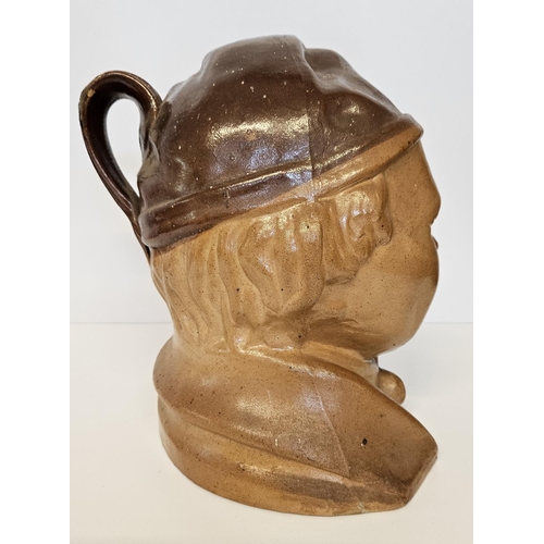 32C - Very large 19th C salt-glazed brown stoneware spirit flask of Souter Johnny. Wearing a smokers hat w... 