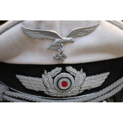 14 - Post War German Luftwaffe Officers Summer visor cap in white with Silver coloured detail and brocade... 