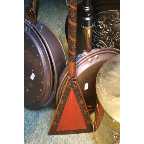 219 - Edwardian Brass lidded coal bucket, 2 Copper Warming pans, Brass Charger and a Wooden painted Paddle