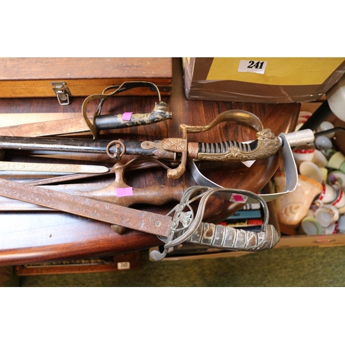 240 - Collection of assorted Swords to include Officers sword, ss sword scabbard, German Dress sword etc.