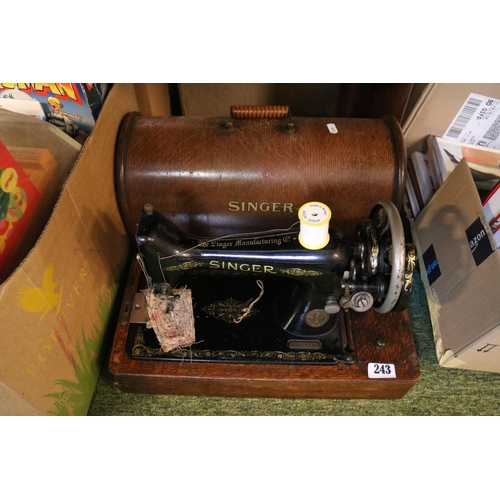 243 - Oak Cased Singer sewing machine