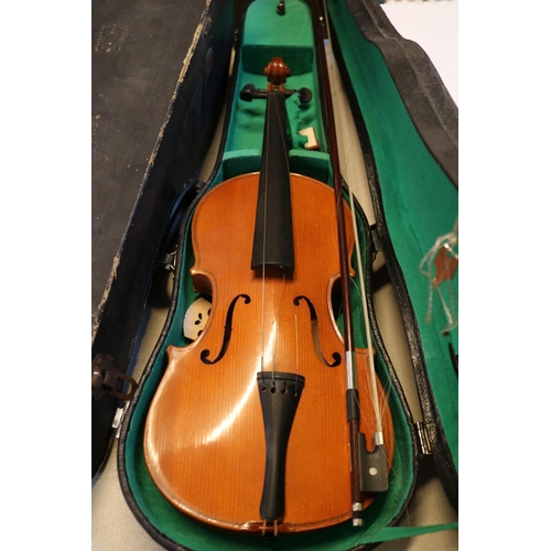 277 - Cased Chinese Violin with bow cased