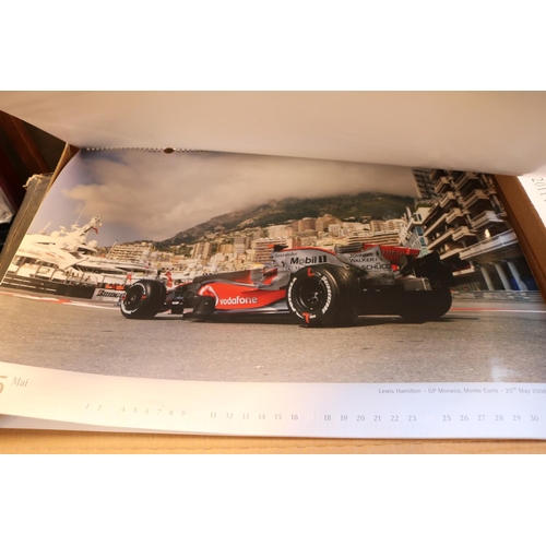 278 - Boxed collection of Formula 1 Mercedes Benz Calendars (7)