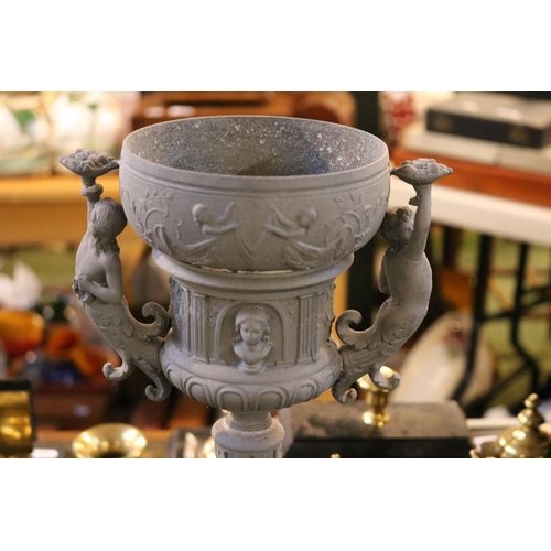 306 - Heavy Cast Iron Early Mortar and a Cast Urn trophy vase with classical decoration