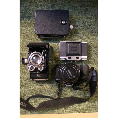 316 - Collection of assorted Cameras and bygones to include Minolta Dynax, Zeiss Ikon folding camera etc.