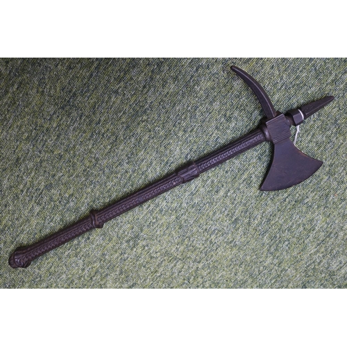 54 - Medieval Ottoman style cast iron war axe with eastern script and figural motif to axe head. 55cm in ... 