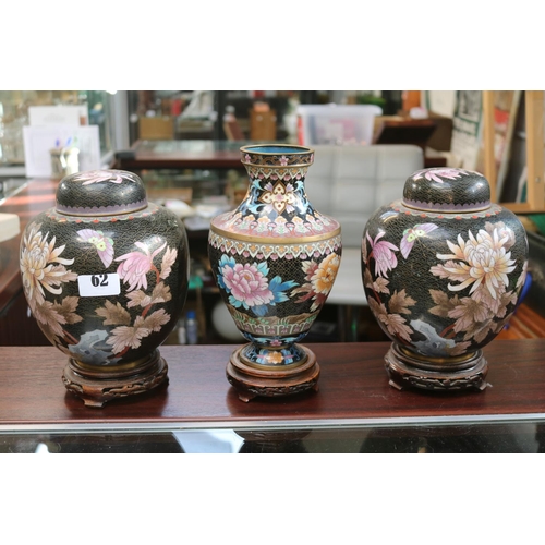 62 - Pair of Chinese Black Cloisonné Spherical lidded jars decorated with Butterfly and Chrysanthemum on ... 