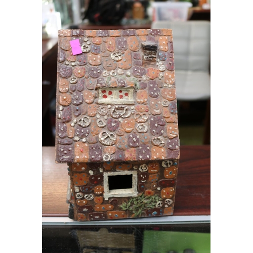 70 - Folk Art Model of a Cottage of Wooden construction with applied decoration. 26cm in Height