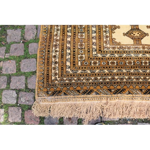 399 - Very Large Indian design Brown ground rug with tassel ends