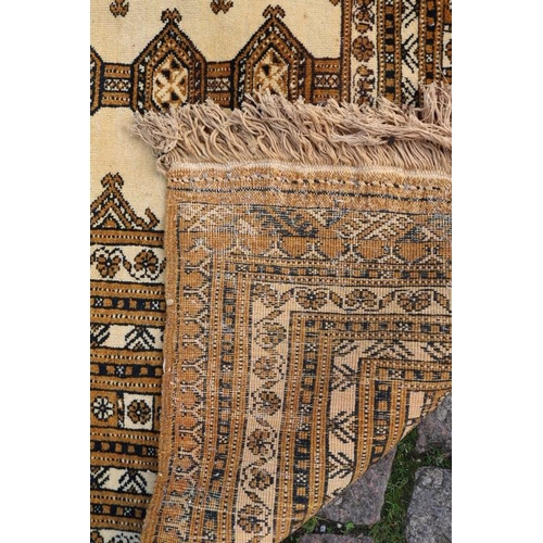 399 - Very Large Indian design Brown ground rug with tassel ends