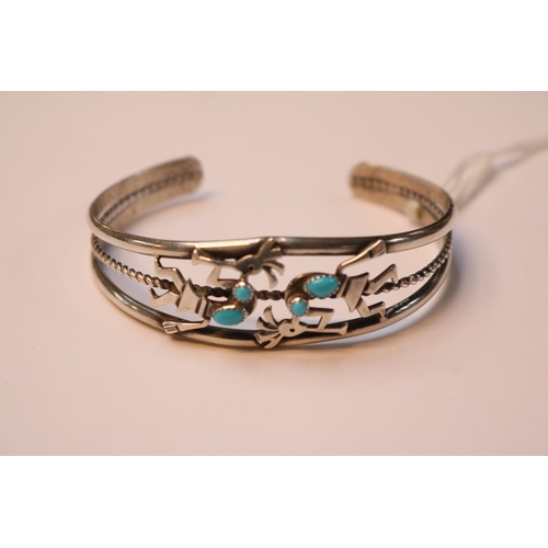 513 - Good quality Native American Silver Turquoise set Kokopele Bangle 18.5g total weight