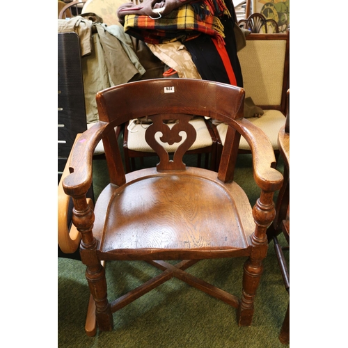 640G - Heavy construction Oak Elbow chair with Pierced Heart back supported on turned legs and cruciform ba... 