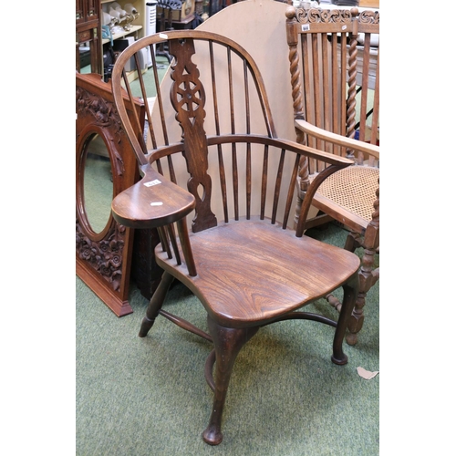 643 - 19thC Elm Windsor Elbow chair with Stick and wheel pierced back over rail and carved seat and pad fe... 