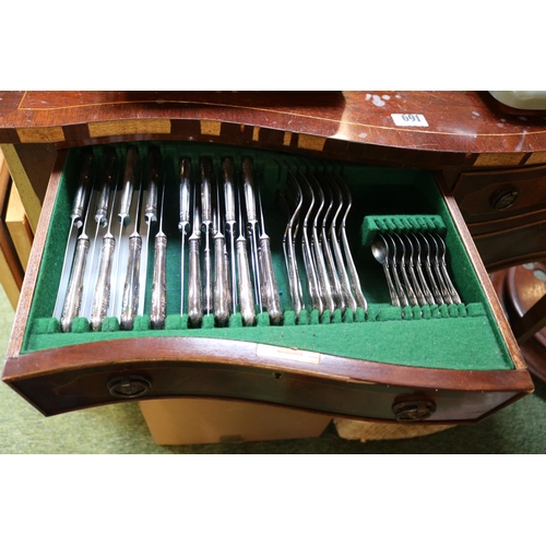 691 - Serpentine fronted Cutlery chest with circular drop handles and fluted legs and contents