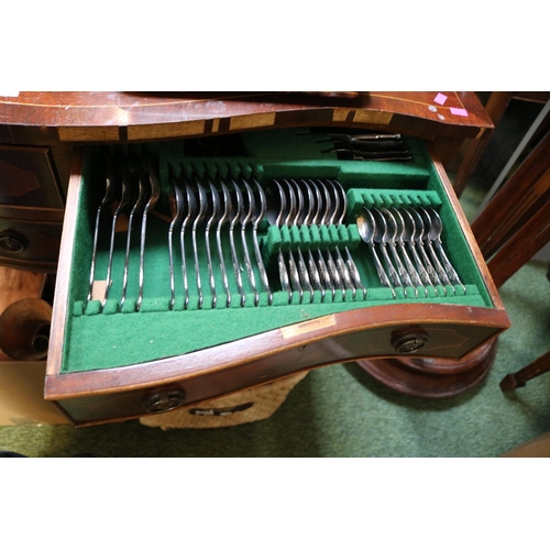 691 - Serpentine fronted Cutlery chest with circular drop handles and fluted legs and contents