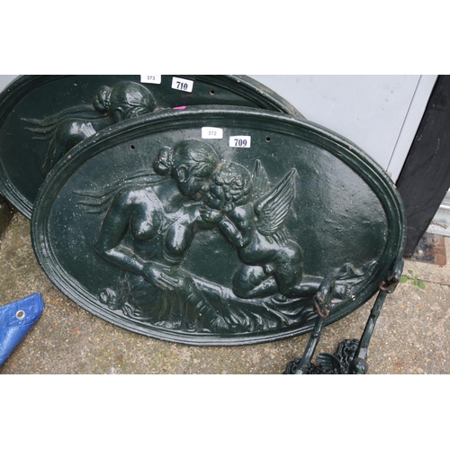 709 - Oval Cast Iron Painted roundel with Nude and Cherub decoration 72cm in Width