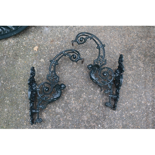 712 - Pair of Fine Quality Figural pierced coat hooks