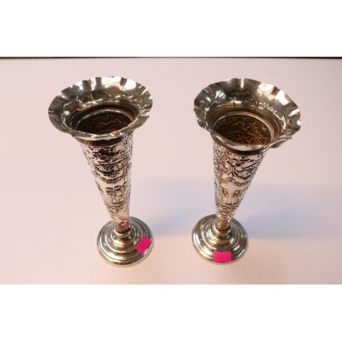 505 - Pair of Good Quality Silver embossed classical decorated flared posy vases London 1907 with weighted... 