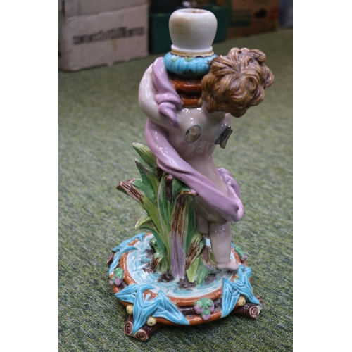 114 - Wedgwood Majolica Cherub/Putti Pedestal Base with reed and fruit decorated base. 28cm in Height