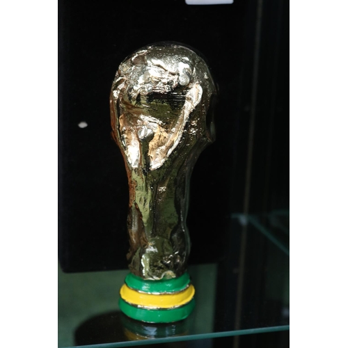 18 - 2002 FIFA WORLD CUP FIVE-TIMES WINNER TROPHY
A miniature trophy in the image of the original FIFA Wo... 