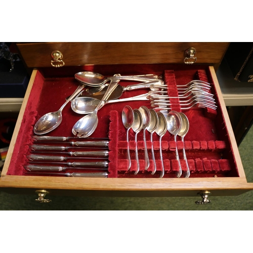 195 - Mappin & Webb Silverplated Oak cased canteen of Cutlery with brass drop handles